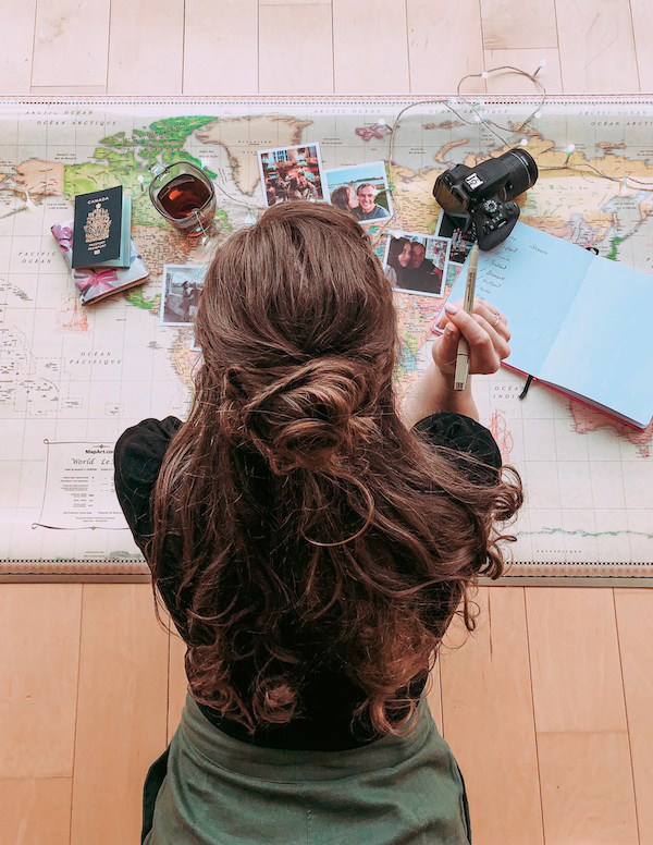 Woman planning her next trip with map 